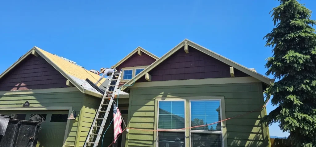 A Lake Effect Roofing crew working on a residential roof installation project in Oregon, Wisconsin.